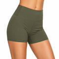 Pantalón corto deportivo de mujer talla M de tejido elástico verde oliva de cintura alta
